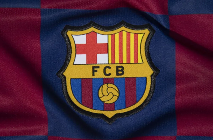 FC Barcelona's emblem with digital blockchain symbols