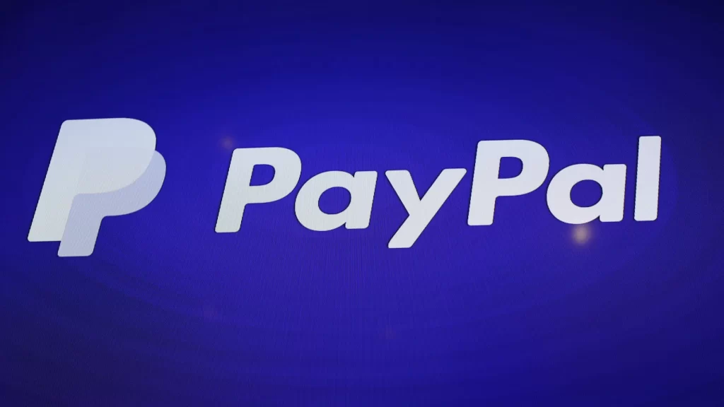 PayPal logo with a stablecoin graphic representation