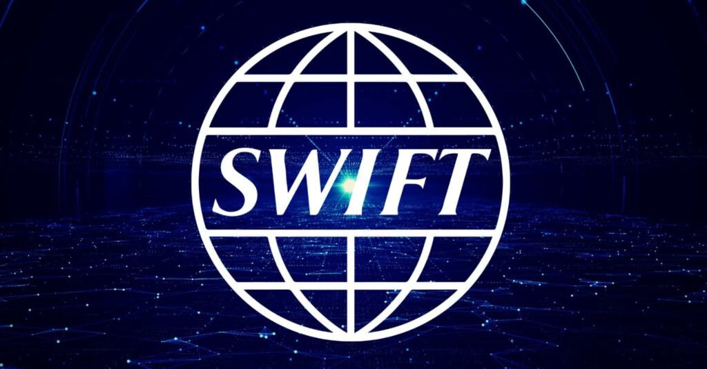 SWIFT logo with interconnected blockchain graphics