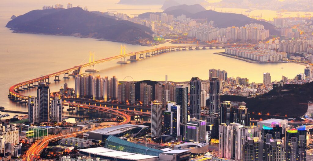 Busan skyline illustrating its transformation into a global blockchain hub